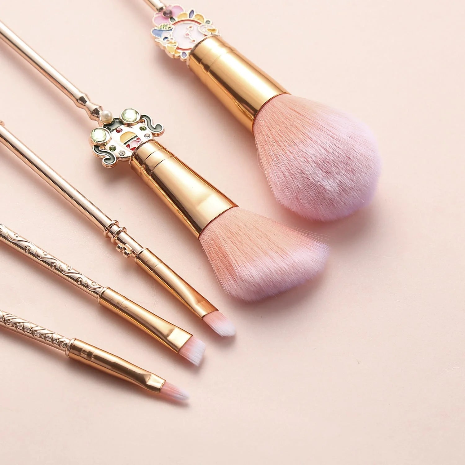 Alice makeup brush in rose gold and gold finishes for precise application