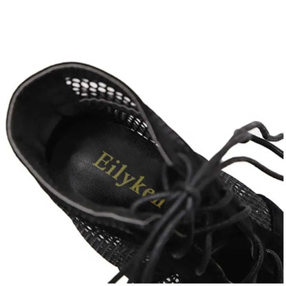 Black suede women's lace-up high-heel shoes with an 11.5 cm heel on a white background.