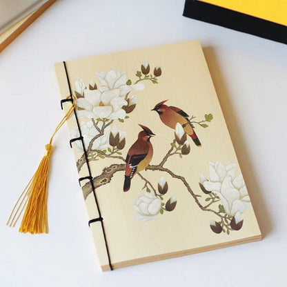 A5 antique wire-bound notebook with classical artwork cover, black oil wax rope binding, and decorative tassels