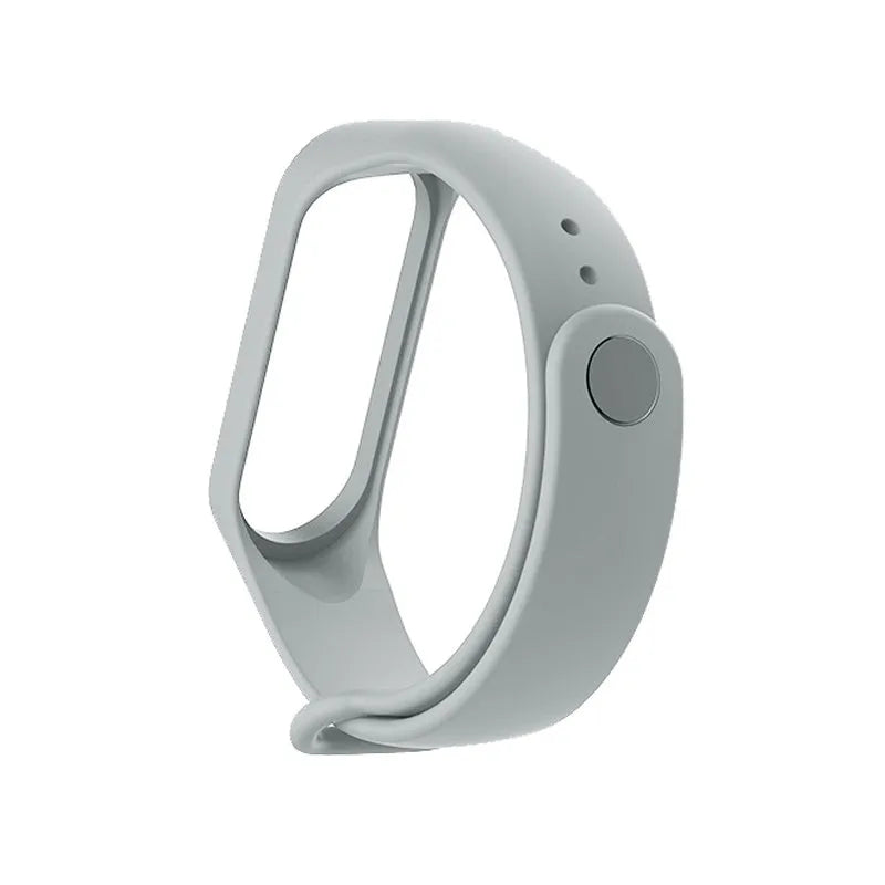 Colourful silicone replacement strap for XIAOMI MI Band 3 smart watch on a wrist.