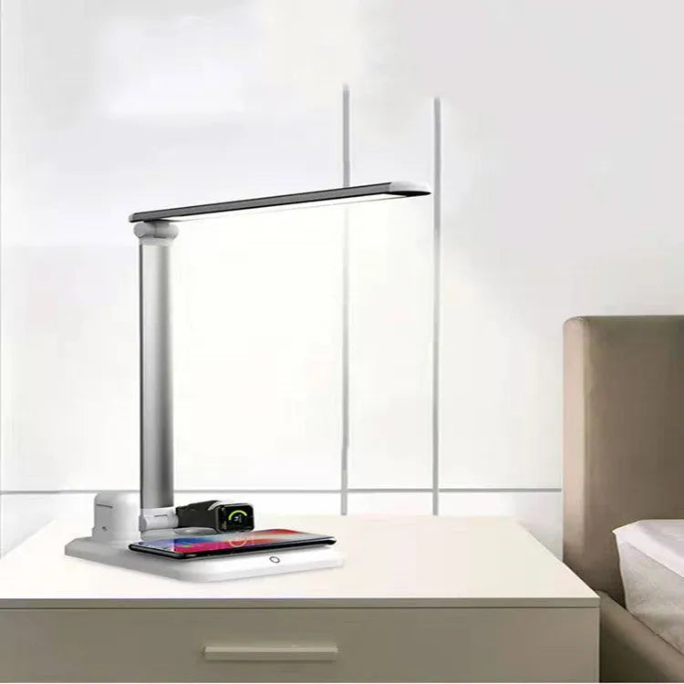 Black and white 4-in-1 multi-function LED desk lamp with wireless charging pad and digital clock display