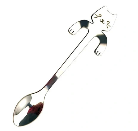 Stainless steel coffee spoon with cartoon cat handle showing hanging hole and smooth edges