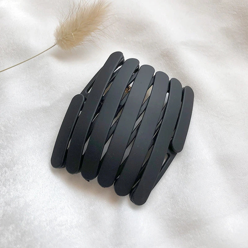 Compact retractable hair band with non-slip teeth grip, available in various colors for versatile styling