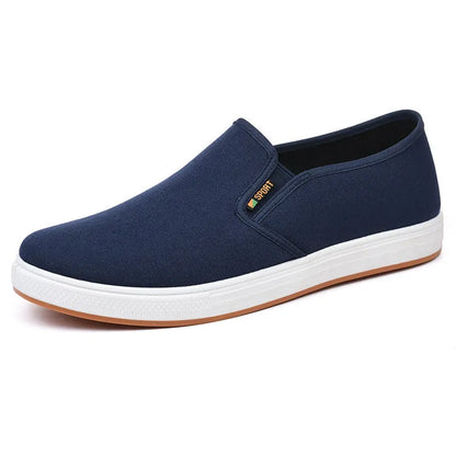 Men's low-top canvas cloth shoes with slip-on design and composite sole in black colour