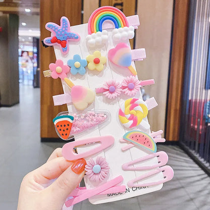 Assortment of colourful toddler hair clips and barrettes with candy, rainbow, fruit, and butterfly designs