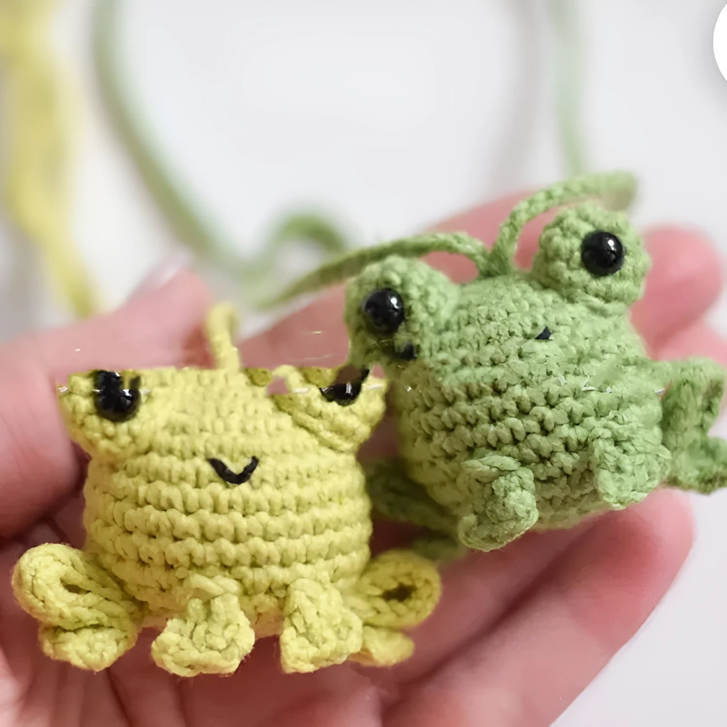 Handmade woven plush frog car pendant in green, 5cm wide by 15cm long