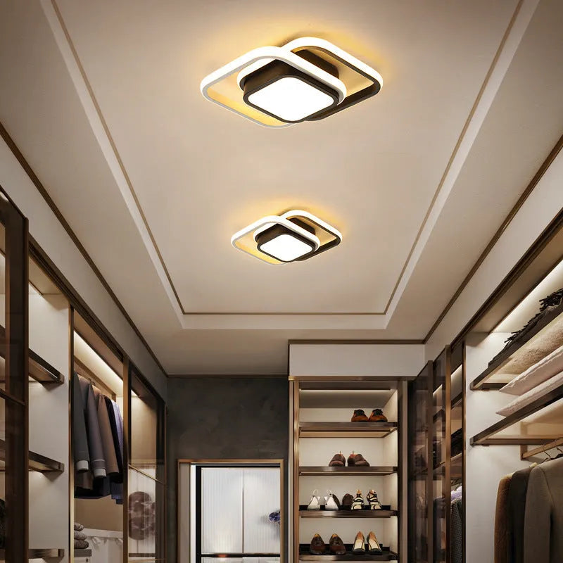 Modern geometric aluminium ceiling light in round and square styles with LED illumination.