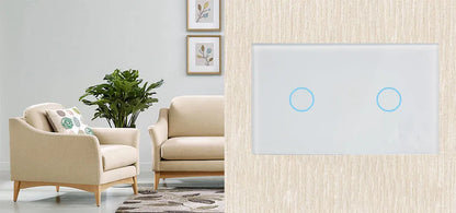 White tempered glass smart touch light switch with blue LED indicator on a UK wall.