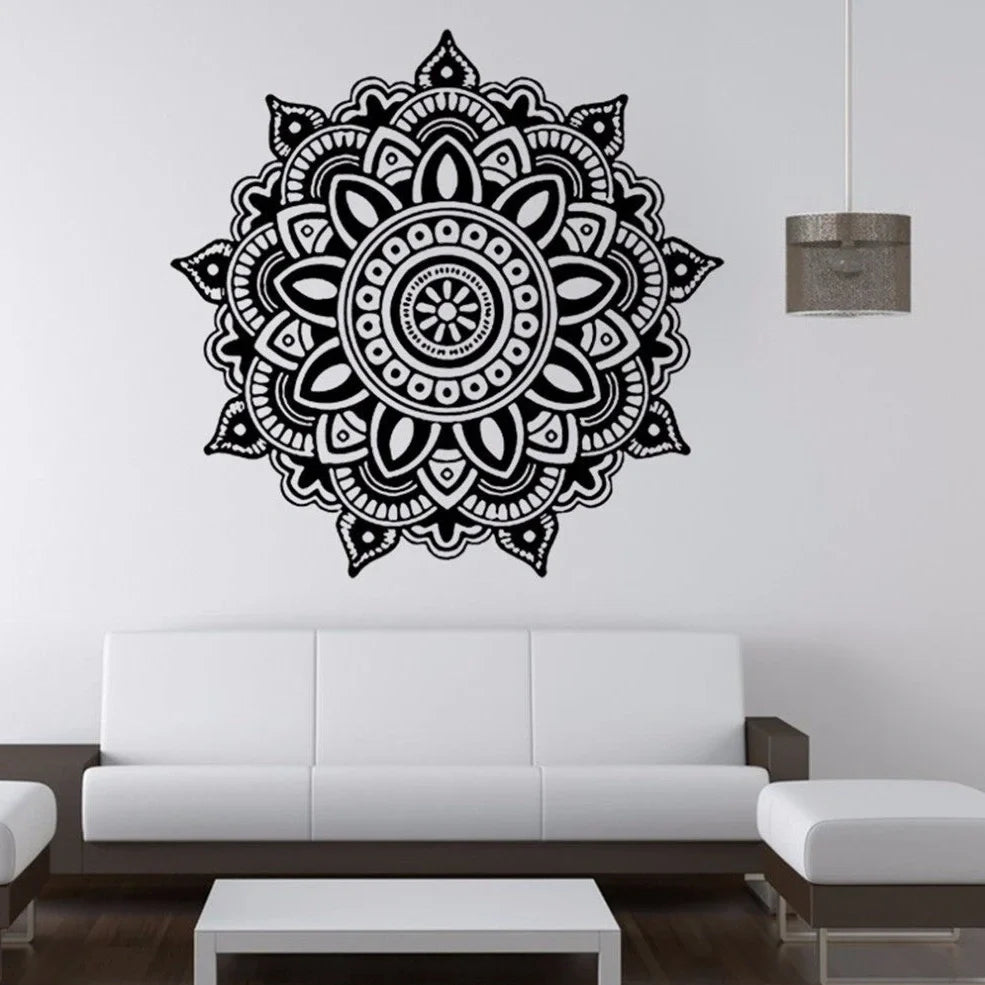 Black square wall sticker measuring 57cm by 57cm with geometric pattern on white wall