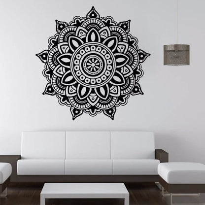 Black square wall sticker measuring 57cm by 57cm with geometric pattern on white wall