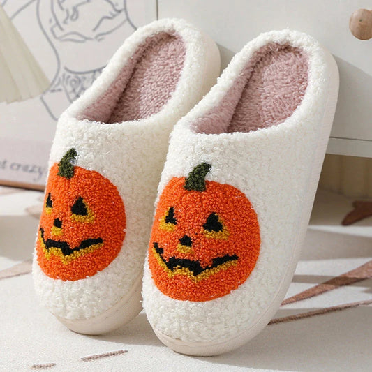 Cozy pumpkin cartoon slippers with soft suede uppers and plush cotton linings for comfortable indoor wear