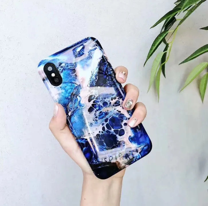 Colourful stone pattern soft back cover phone case for iPhone models on a white background.