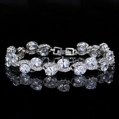 Copper-plated gold bracelet with AAA+ zircon stones in simple geometry style measuring 18.4cm length
