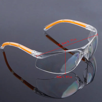 Transparent polycarbonate safety goggles with yellow frame for lab and welding protection.