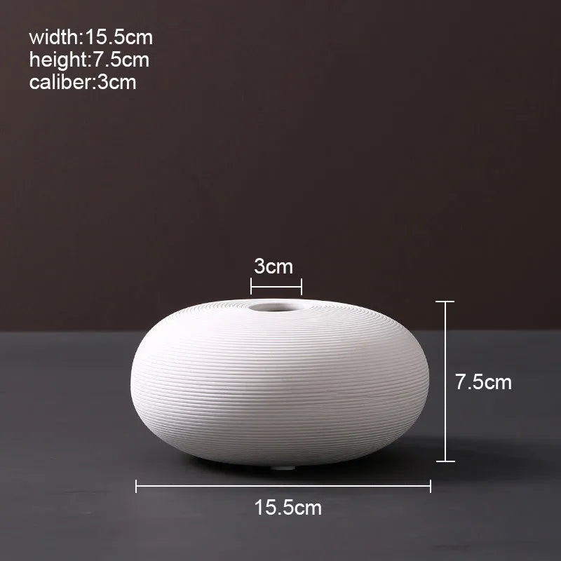 Modern Scandinavian ceramic vase with textured inlay surface decoration