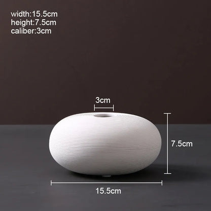 Modern Scandinavian ceramic vase with textured inlay surface decoration