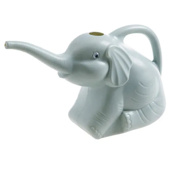 A pink children's elephant-shaped watering can with a long nozzle and baby bottle handle for gardening.
