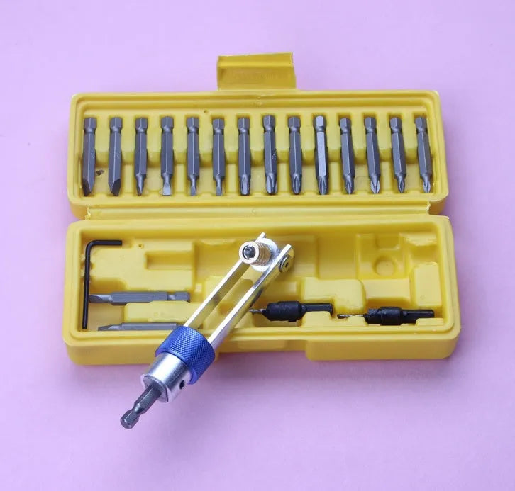 Half Time Drill Driver adapter set with swivel head, shown with Phillips, flathead, and countersink bits on a workbench.