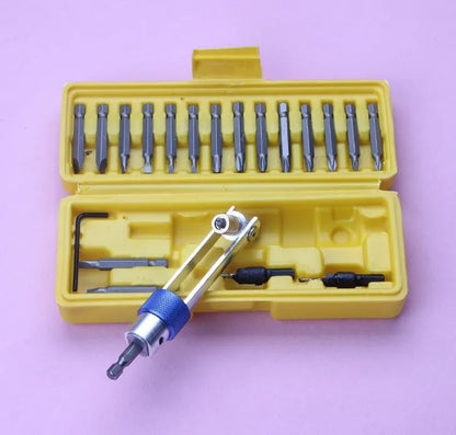 Half Time Drill Driver adapter set with swivel head, shown with Phillips, flathead, and countersink bits on a workbench.