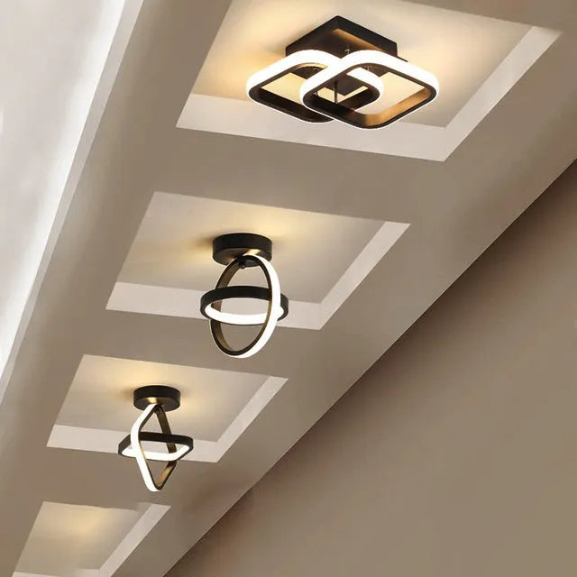 Modern round ceiling light with 21cm diameter and 25cm height in black or white finish