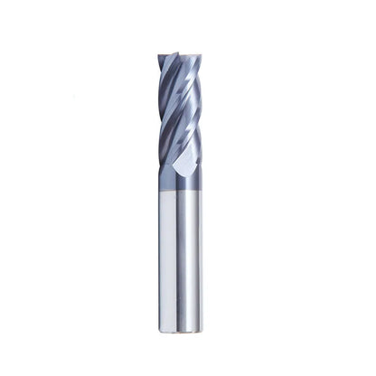 Set of straight shank carbide spiral milling cutters in various sizes on a workshop bench.