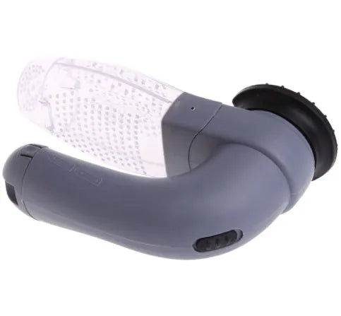 Grey handheld electric pet hair remover brush with soft rubber head for grooming dogs and cats.