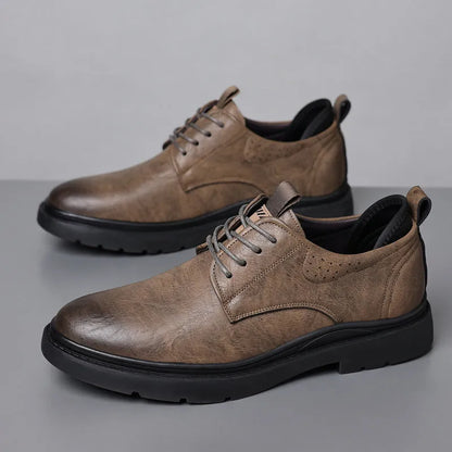 Men's black and brown leather shoes with rubber sole and sewing line detail for business and casual wear