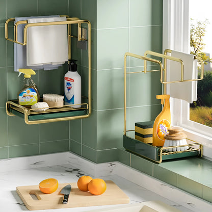 Gold wall mounted sponge holder with removable drip tray holding brushes and soap
