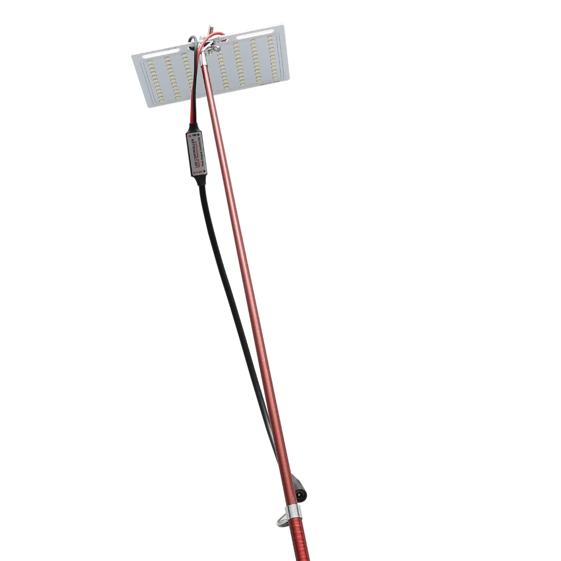 White LED fishing rod light unit with remote control, mounted on a rod for night fishing illumination.