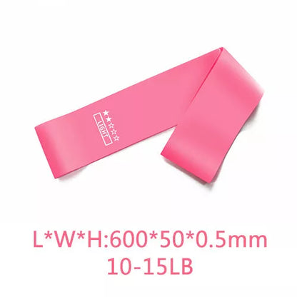 Yoga tension band set in five colours with varying resistance levels for fitness and Pilates