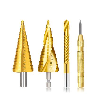 High-speed steel cone step drill bits and a centre punch laid out on a workbench.