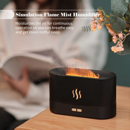 Black square ultrasonic aroma diffuser with flame light effect and mist output.