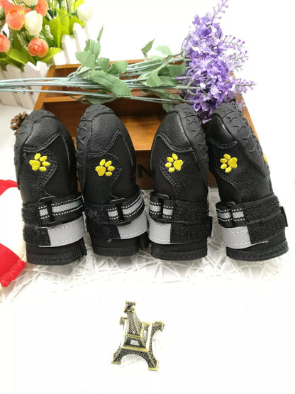Black waterproof dog shoes with non-slip soles and adjustable fuzzy belt