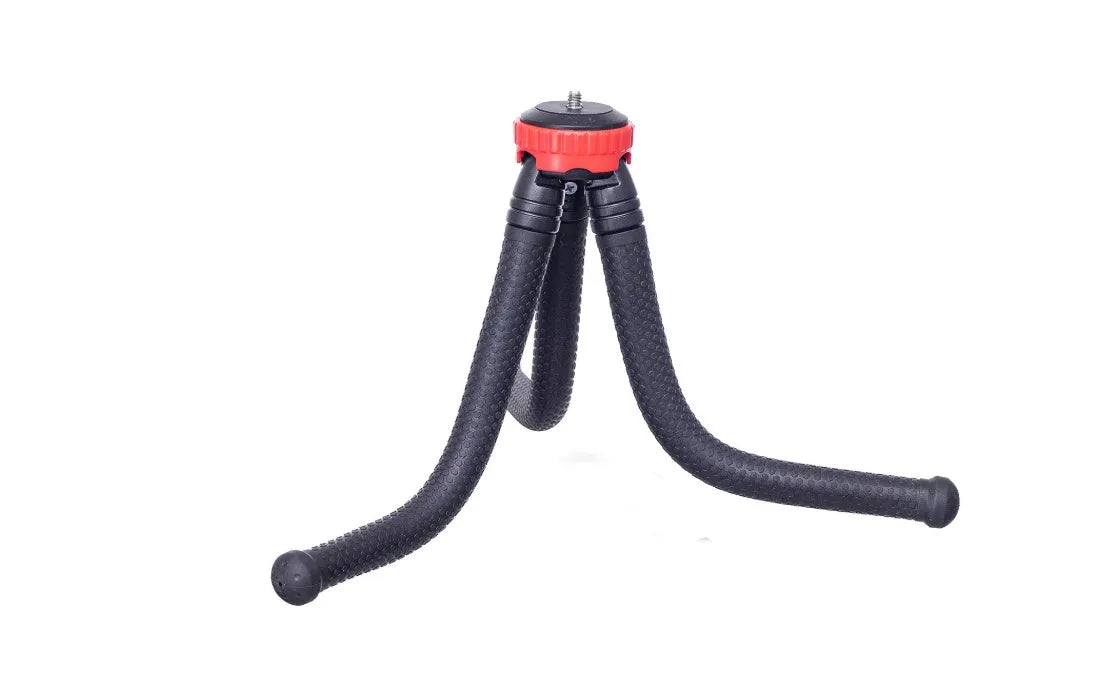 Black octopus tripod with flexible rubber legs wrapped around a pole, holding a smartphone.