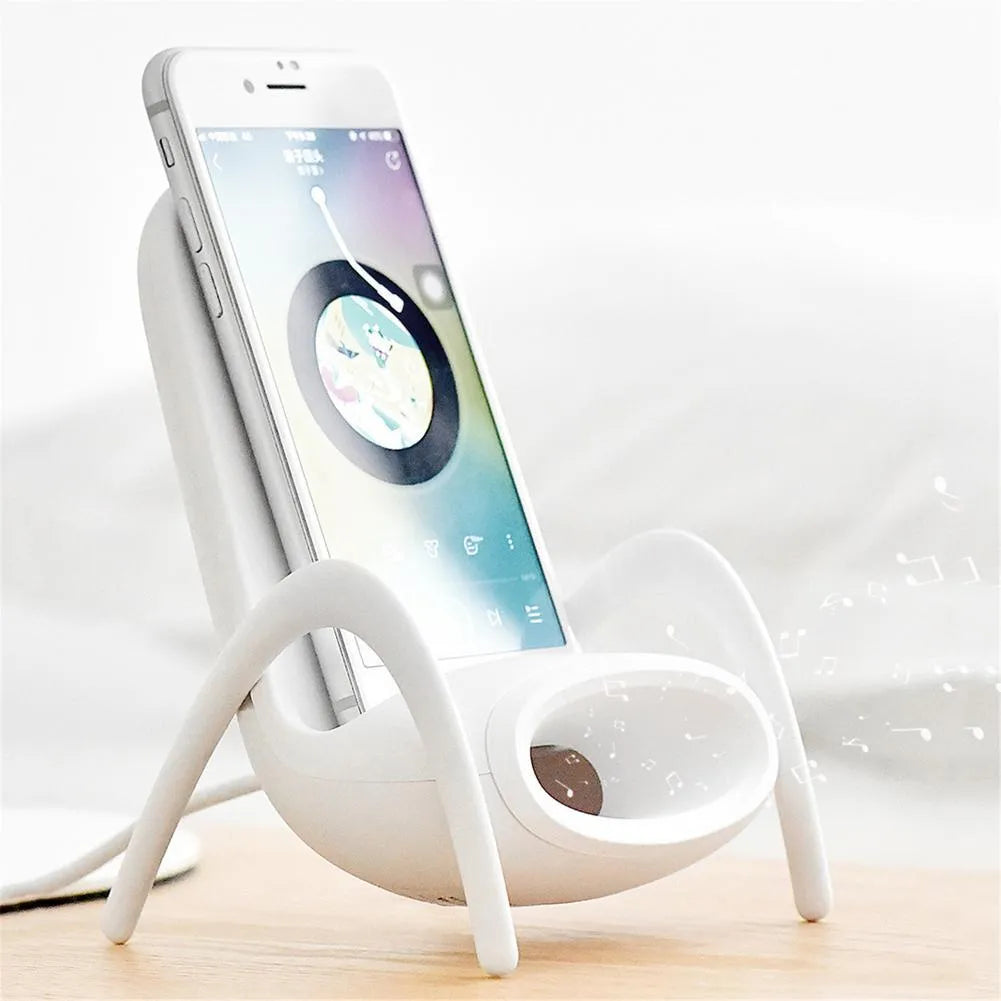 White portable mini chair wireless charger on desk with phone, showing compact 96.3mm size and fast charging