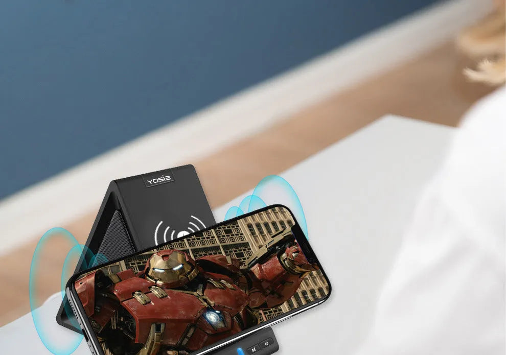 Black multifunctional device with Bluetooth speaker, phone stand, and wireless charging capabilities, dimensions 165x80x130mm
