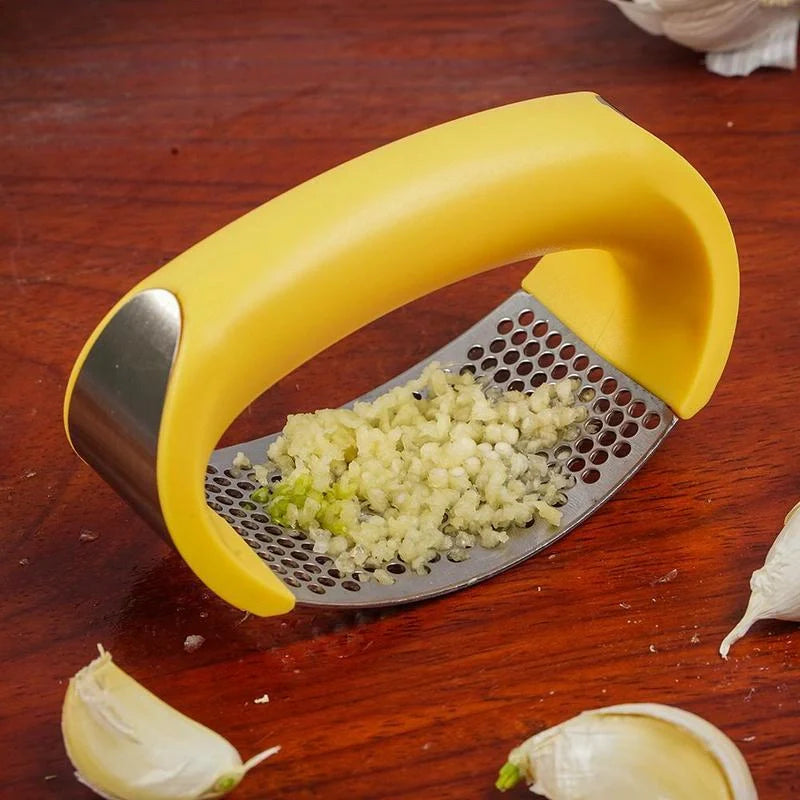 Stainless steel garlic press with non-slip handle for easy crushing