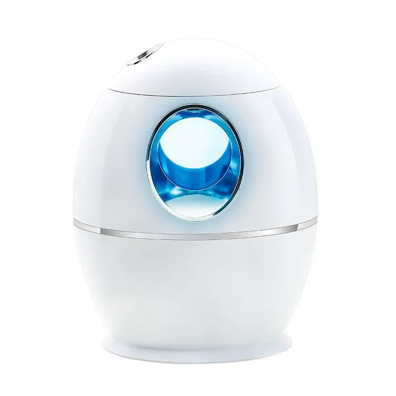 White columnar air disinfection humidifier with USB cable on wooden surface
