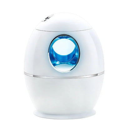 White columnar air disinfection humidifier with USB cable on wooden surface