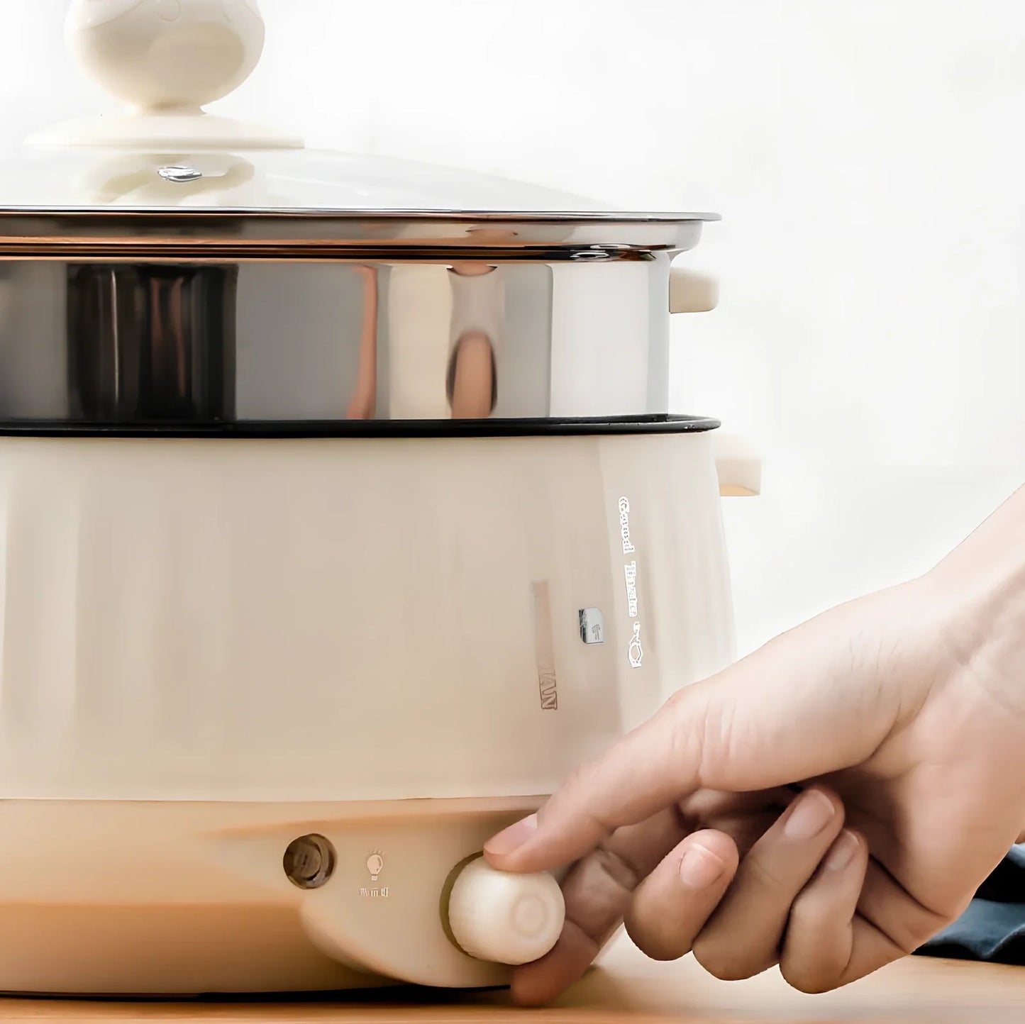 Beige 1.7L electric cooker with 20cm pot and 7cm steamer, 400/800W for boiling and steaming
