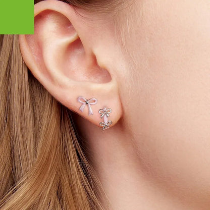 S925 sterling silver bow ear clip earrings for women in SCE1926 colour with dripping oil finish, supplied as a pair