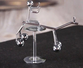 Elegant Balance Iron Man Tumbler with Captivating Swinging Motion and Stainless Steel Construction