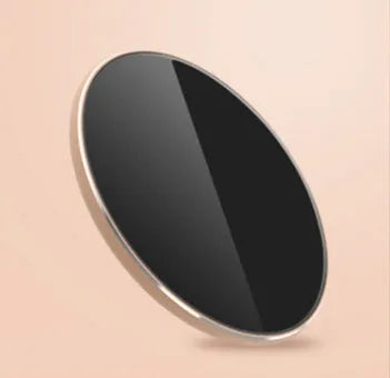 Ultra-thin aluminium wireless charger in rose gold with micro USB port and status light.
