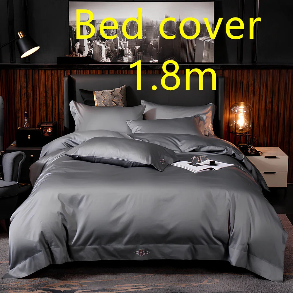 Four-piece cotton bedding set with satin weave fabric showing quilting detail and colour options