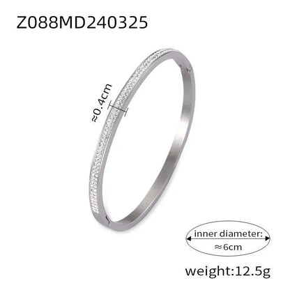 Titanium steel Roman numeral bracelet with gold plated carved design and diamond-embedded detail