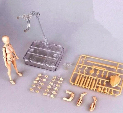 Articulated artist mannequin kit with interchangeable hands and accessories