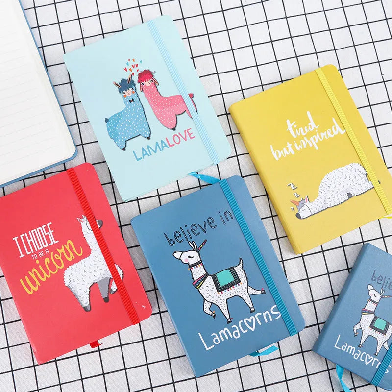 Alpaca cartoon design notebook in A5, A6, and A7 sizes showing yellow paper inside.