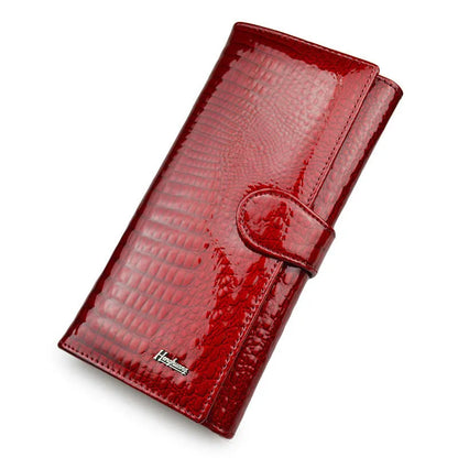 Women's patent leather coin purse with crocodile pattern in red colour option