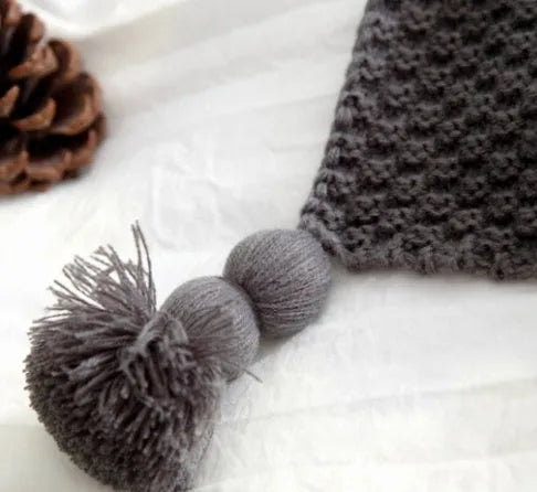 Nordic fringed knit ball acrylic blanket in beige colour measuring 130×170cm
