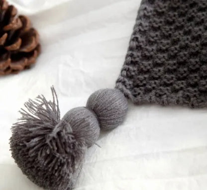 Nordic fringed knit ball acrylic blanket in beige colour measuring 130×170cm